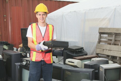 Team members wearing PPE during a flat clearance operation